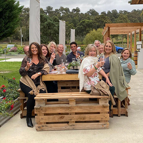 A group enjoying lunch at a winery in the Yarra Valley, Victoria